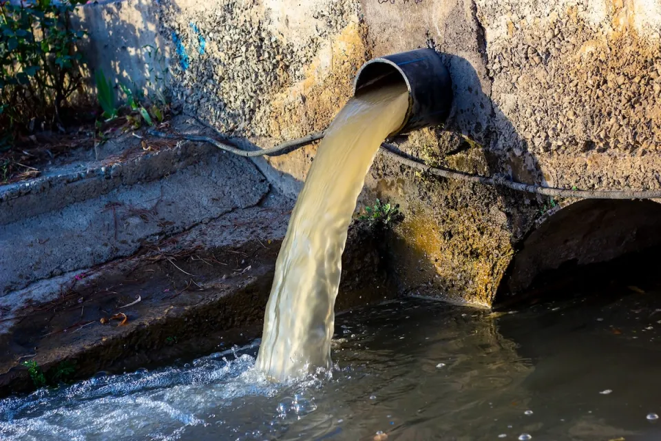 Wastewater pouring out from a pipe.